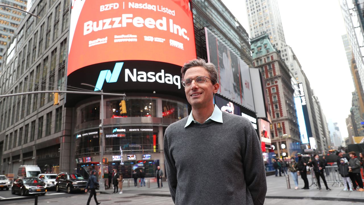 Founder and CEO of BuzzFeed Jonah H. Peretti poses in front of BuzzFeed screen on Times Square during BuzzFeed Inc.'s Listing Day at Nasdaq on December 06, 2021 in New York City. 