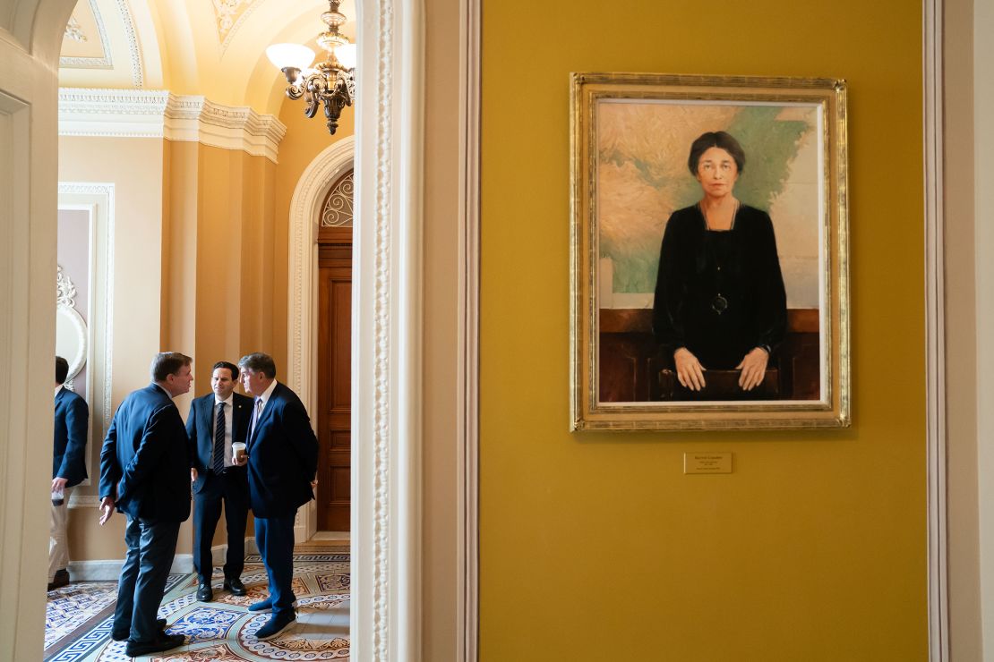 Sen. Mark Warner, Sen. Brian Schatz and Sen. Joe Manchin speak outside the Senate Chamber following passage in the House of a 45-day continuing resolution on September 30, 2023 in Washington, DC.