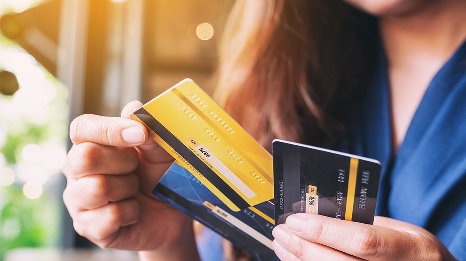 Woman holding credit cards